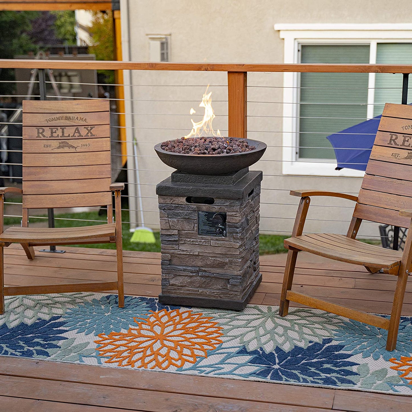 "Create a Cozy and Elegant Outdoor Ambiance with the Newcastle Propane Firebowl Column - Realistic Look Firepit Heater with Lava Rock, 40,000 BTU - Perfect for Outdoor Gatherings - Natural Stone Design - Pack of 1"